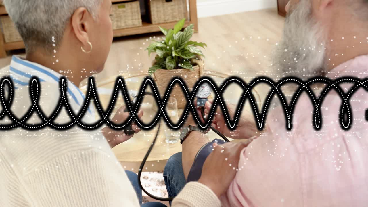 Man offering arm woman fitting cuff inflating and reading gauge for health loop graphic over frame