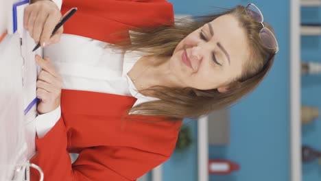 Vertical-video-of-Ambitious-and-determined-portrait-of-home-office-worker-woman.