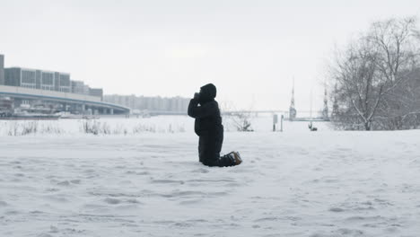 sad man falling on his knees at the street