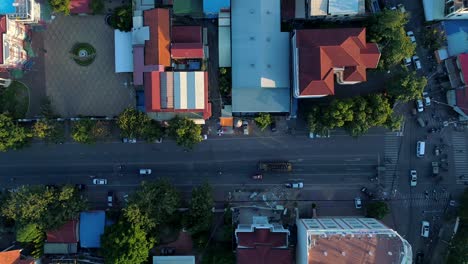 aerial crowded streets phnom penh motorbike vehicle community city cambodia crime human trafficking urban capitol city buddhism temple palace 4k