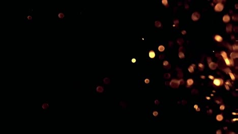 gráficos de movimiento de partículas de fuego con fondo nocturno
