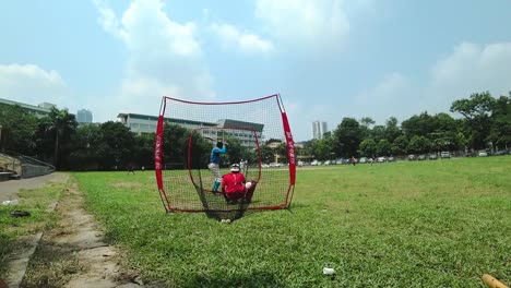 Guys-playing-baseball-on-a-sunny-in-Vietnam