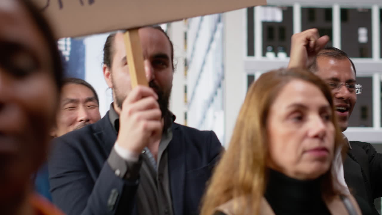 People and activists protesting against corruption during a public march