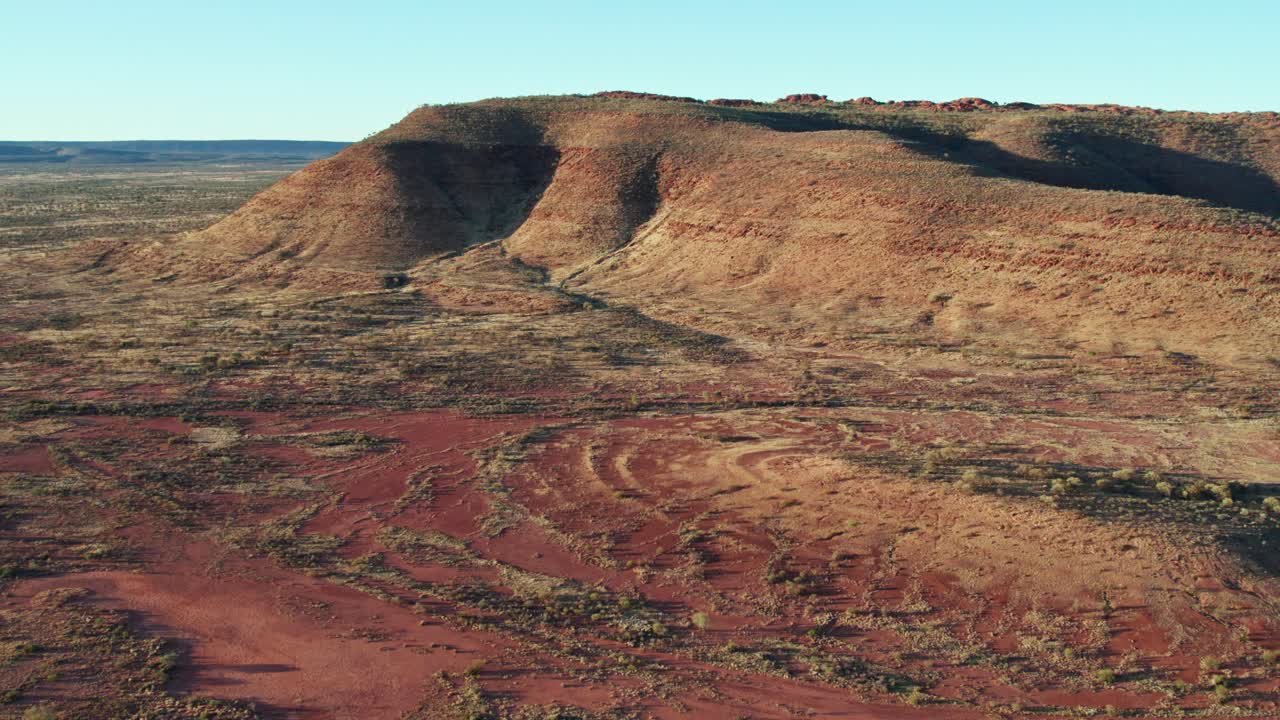 Aerial view of interesting landscape features near Kings Canyon, Watarrka, in the Northern Territory, Australia. August 2022.