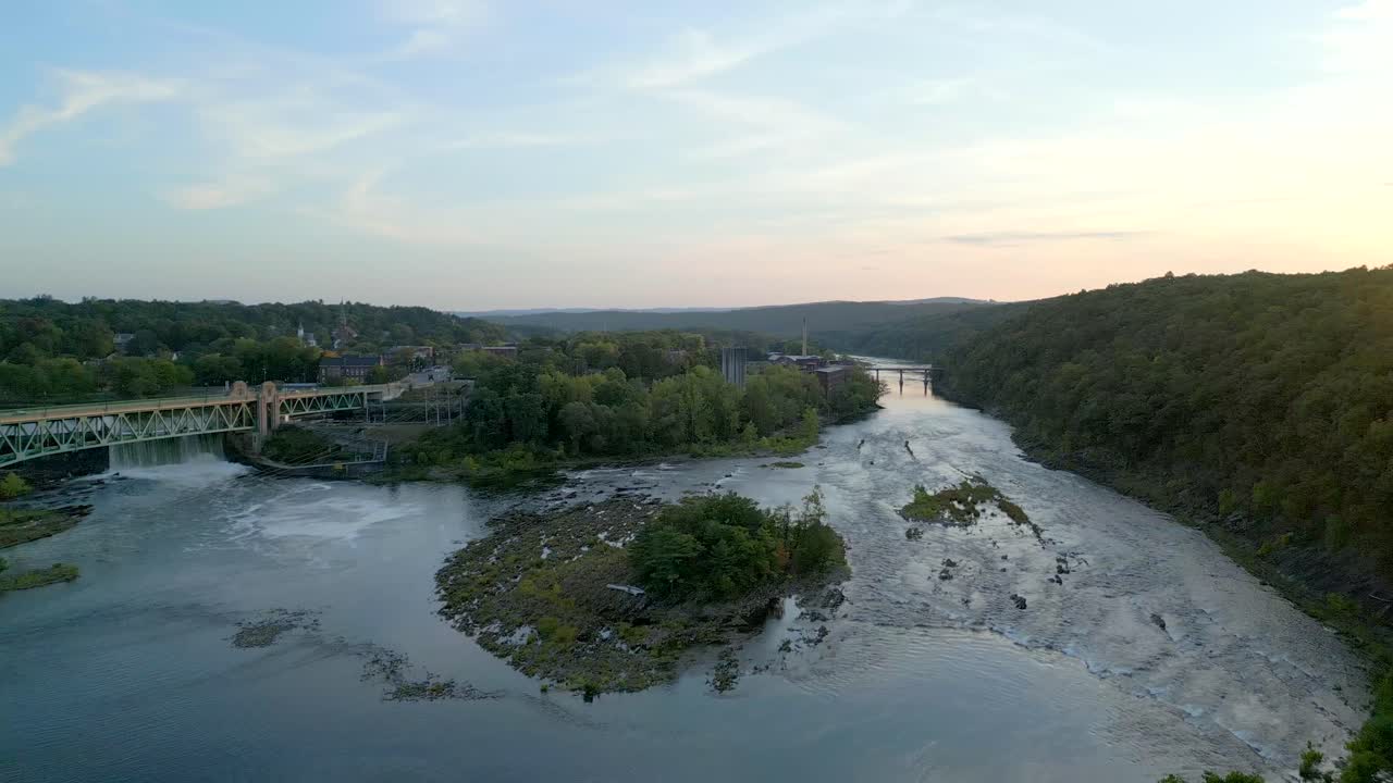 Connecticut River, Turners Falls-Gill Bridge, Turners Falls Dam And Peskeomskut Island In Massachusetts, USA. - aerial shot