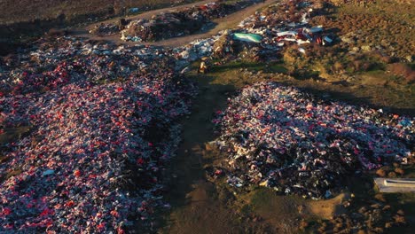 ascending aerial over refugee lifejacket dump lesvos