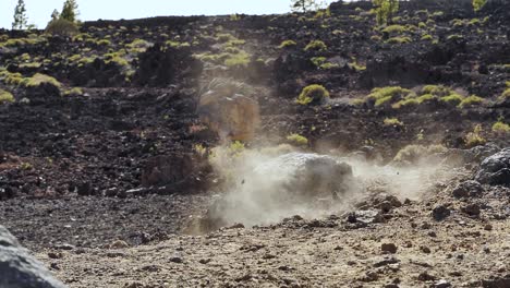 static slow-motion shot of rock crashing and exploding into pieces