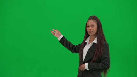woman presenter in business attire on green screen
