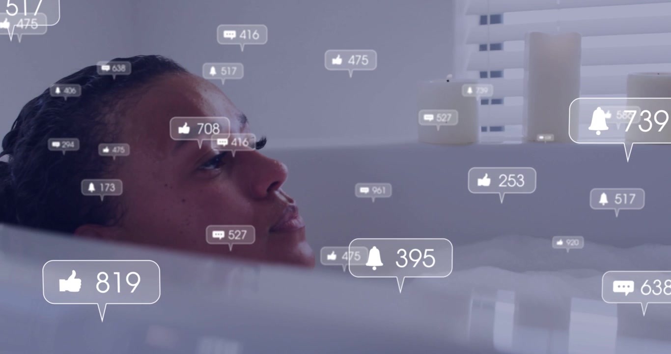 Woman resting in tub opening eyes while camera zooming, visualizing social-media engagement bubbles