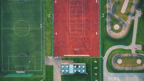 Recreational-green-grass-active-sports-hockey-and-football-fields-overhead-top-down-view