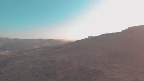 Drone-flying-over-mountain-in-Greece