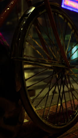 bicycle with colorful reflections in the urban nightlife