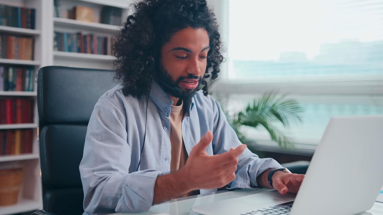 Young arabian student man talks on video call in laptop passes distance exams
