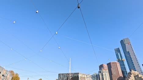 tram cables above melbourne's urban skyline