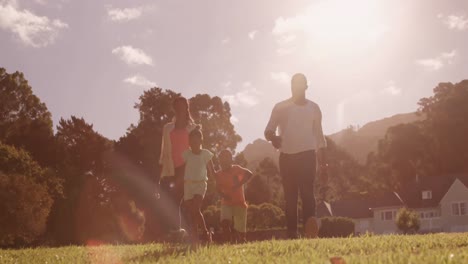 family walking and jumping