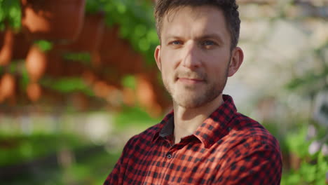 happy gardener in greenhouse environment