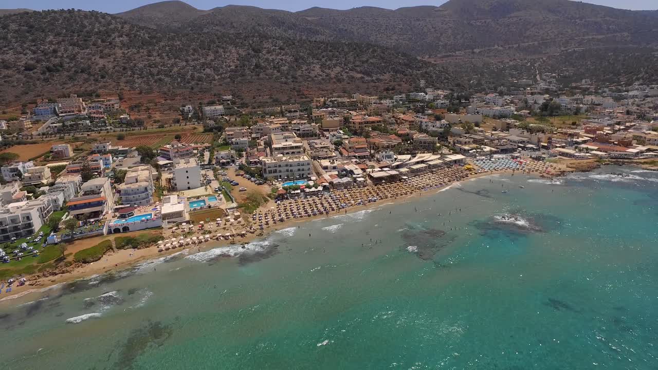 The touristic city of Stalis with beach resorts during summer