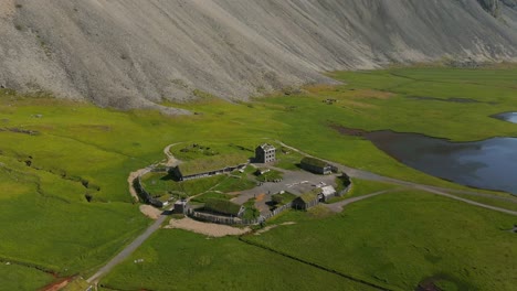 experience the breathtaking aerial views of the viking village in iceland, where history meets stunning landscapes. discover the charm of traditional architecture from above!