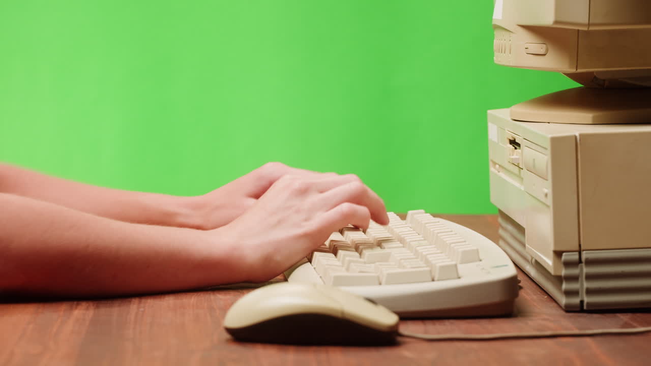 Person using a vintage computer
