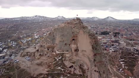 cappadocia, a semi-arid region in central turkey, is known for its distinctive fairy chimneys tall, cone-shaped rock formations clustered in monks valley, göreme and elsewhere