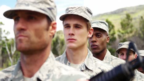 group of military soldiers standing with rifles 4k