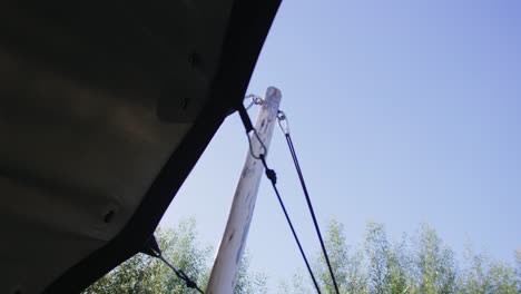 setting up a big stretch tent with ropes