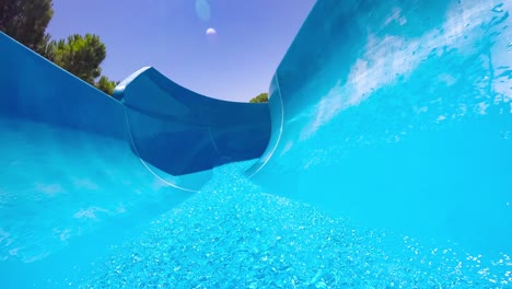 First-person-view,-the-descent-from-the-waterslide-on-holiday