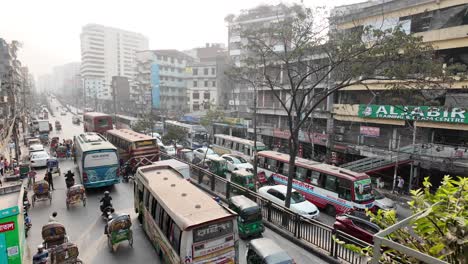 busy street scene with traffic in dhaka, bangladesh