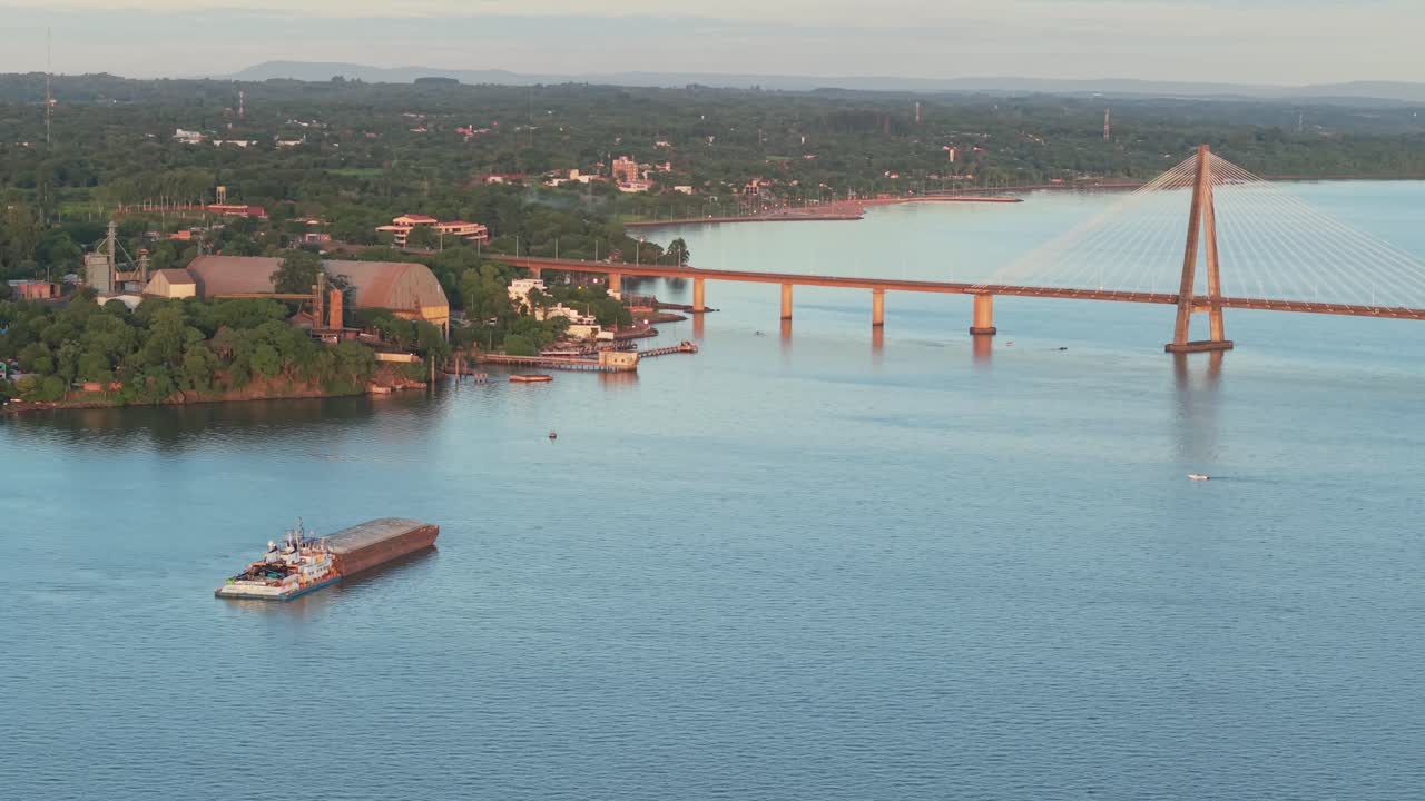 Aerial view of bulk carrier navigating Parana River, Encarnación, Paraguay