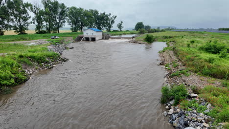 springtime river during rainfall in the europe