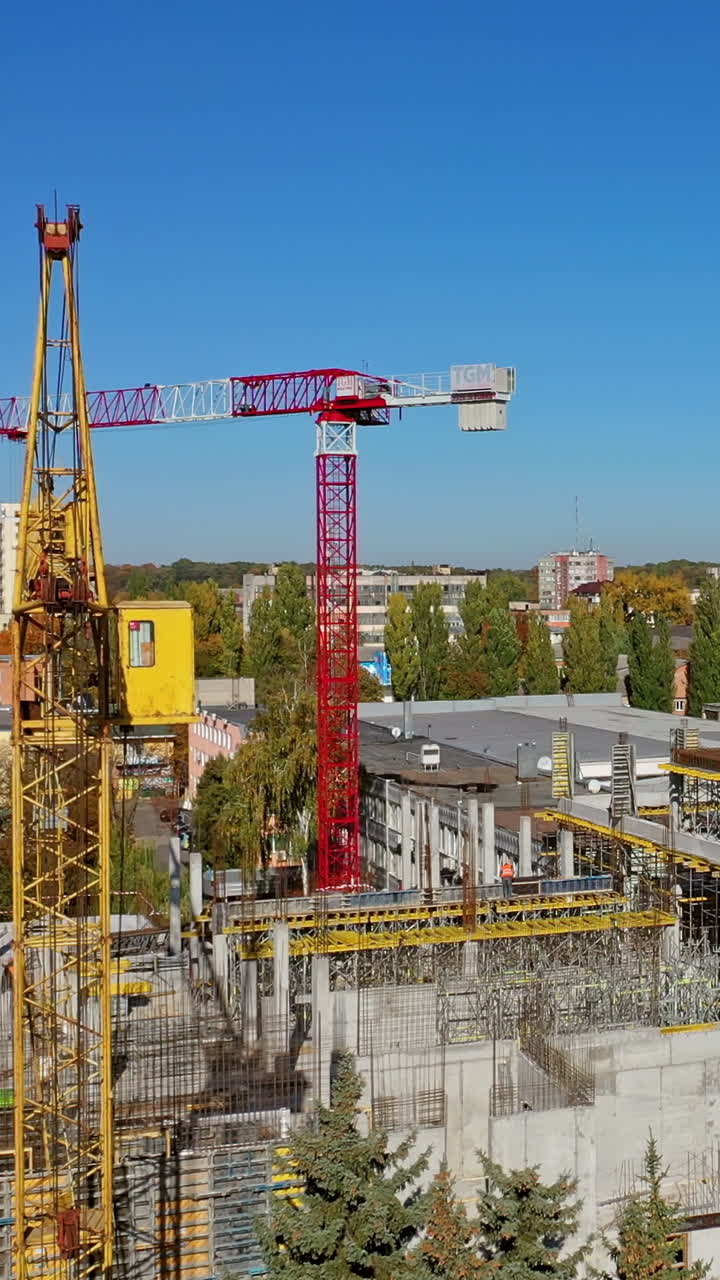Construction site shot from above. Vertical video