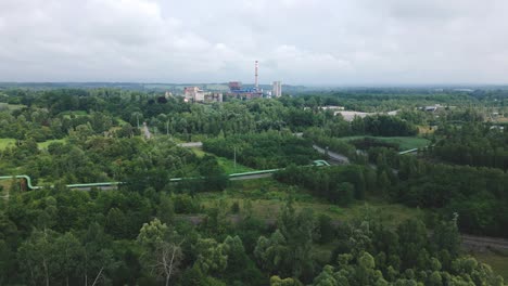 post industrial coal mining, steelworks landscape amid green regeneration aerial