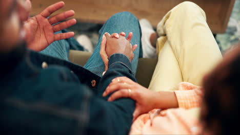 couple holding hands in a loving relationship