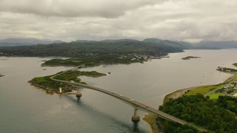 west coast artery: aerial footage of skye bridge connecting scottish highlands to the isle of skye, scotland, united kingdom