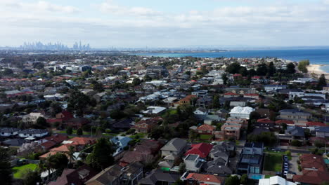 AERIAL-Over-Melbourne-Western-Suburb-Of-Altona-With-Port-Phillip-Bay