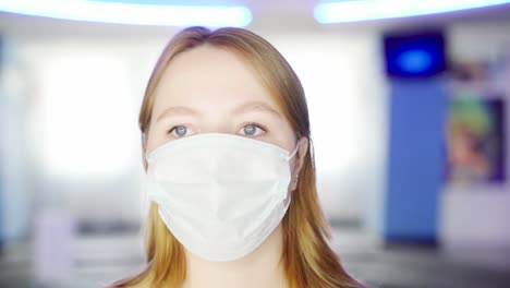 woman getting her temperature checked at the entrance