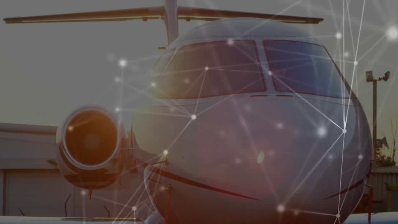 Animación de red de conexiones y procesamiento de datos sobre un avión en la pista