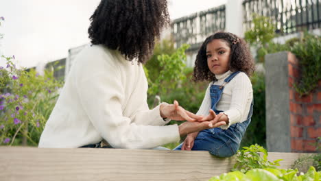 mother, hand and cleaning with child in garden