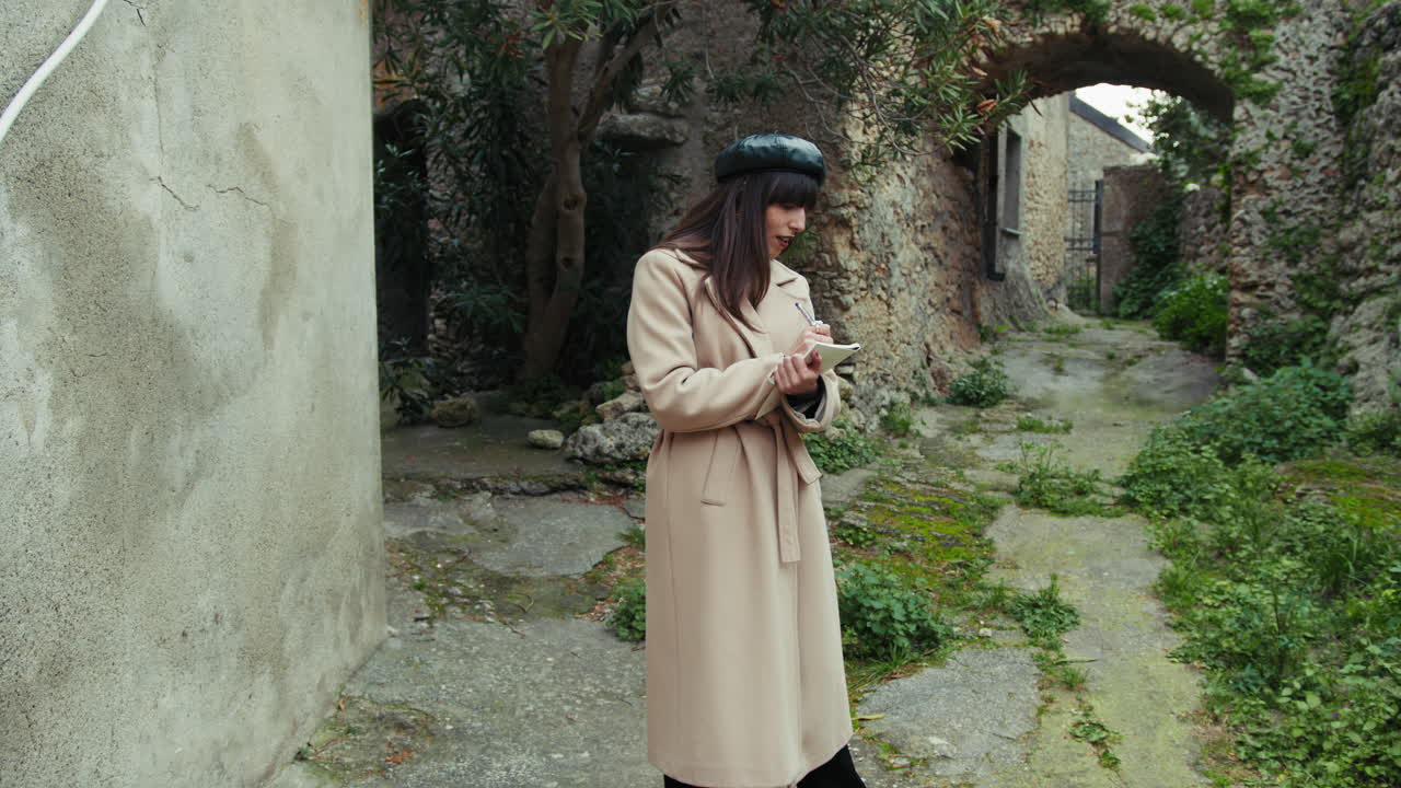Woman Taking Notes Amazed By The Nature In The Small Italian Town
