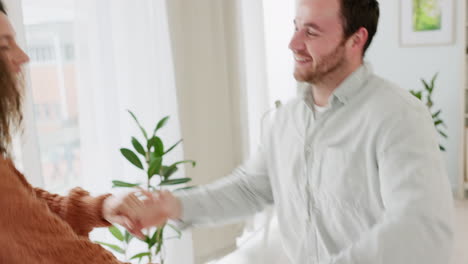 Happy-dancing-couple,-home