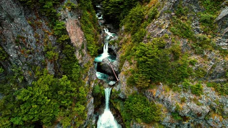 New-Zealand-Drone-Aerial-of-Devil’s-Punchbowl-Waterfall,-Filming-Stream-and-Falls