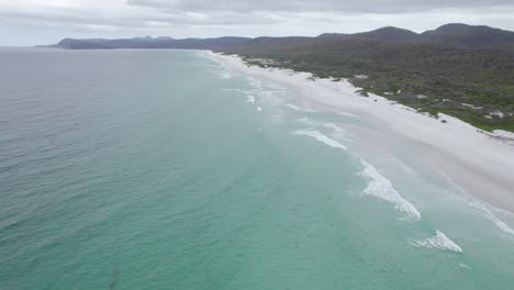 pristine white sand beach with tranquil waters in friendly beaches, tasmania, australia