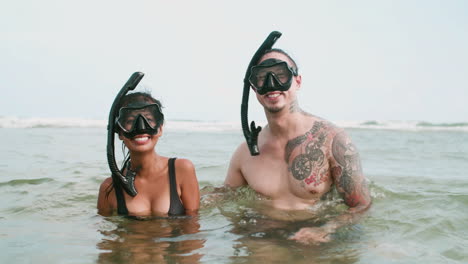 couple with diving goggles on