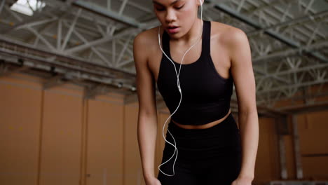 young athlete warming up indoors