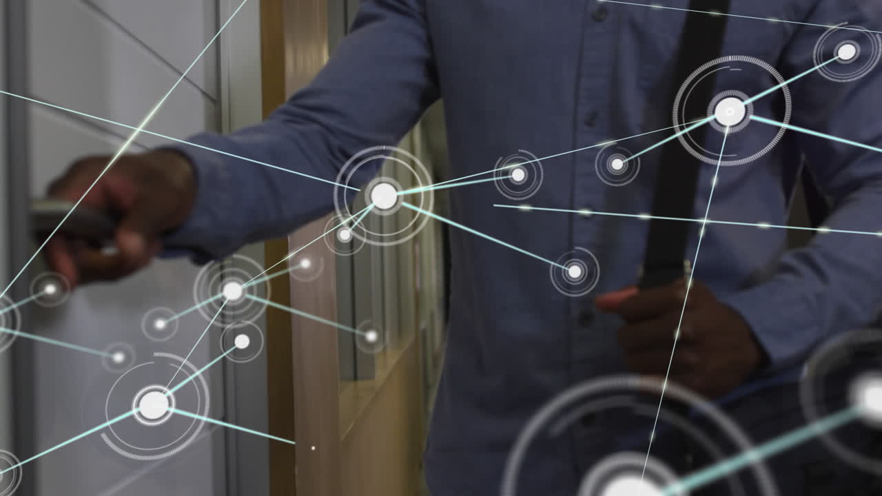 Animation of dots connected with lines over african american businessman opening office door
