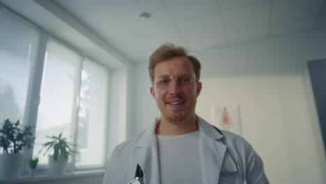 pov video doctor consulting patient in clinic. physician giving medical advice.