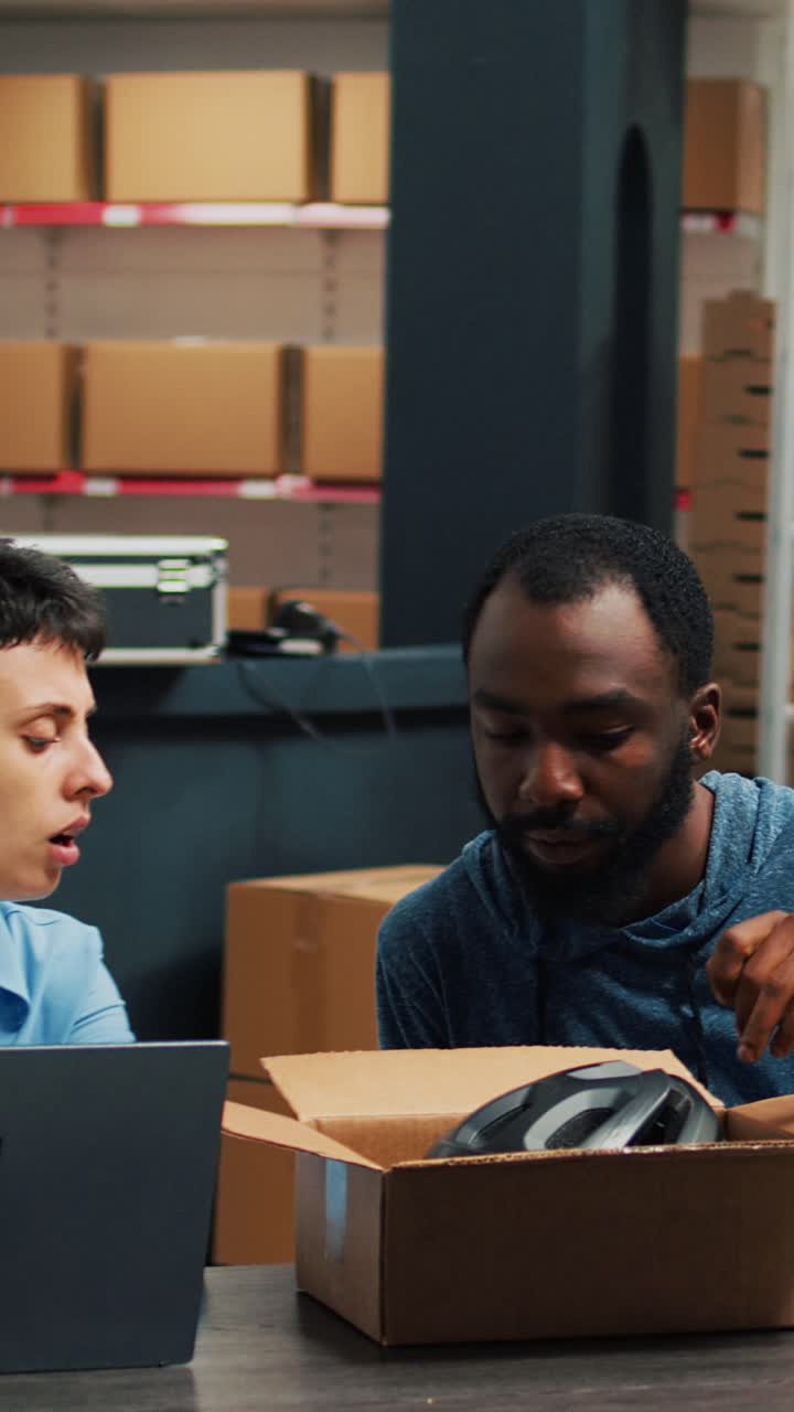 Vertical video: Diverse team of people preparing products order in storehouse space