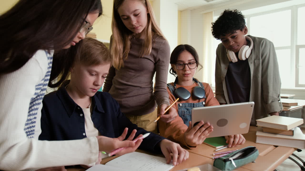 Diverse group of students collaborating and studying together in a classroom