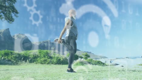 Animation-of-data-processing-over-senior-african-american-man-stretching-at-beach