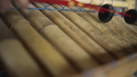 Slow-Motion-handheld-shot-of-someone-playing-an-Indonesian-Xylophone